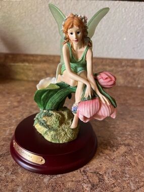 Porcelain Fairy Figurine with Pink Flower